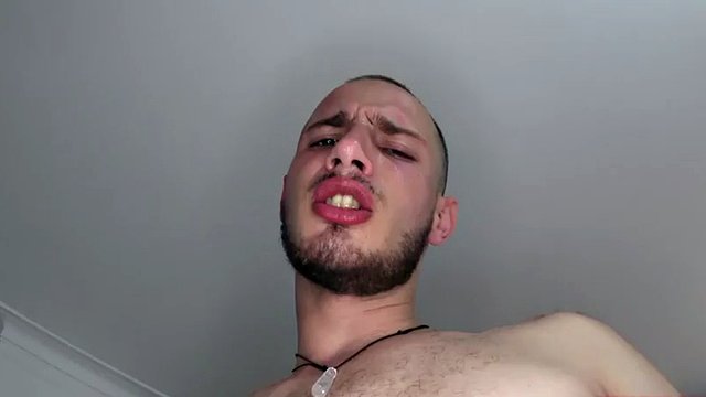 A gloved hand joins Belus on the bed, where he is already in his underwear. The hand touches his cock and ass, before the horny Latino undresses. The hand touches and caresses Belus again, along with him fucking himself with a big dildo.