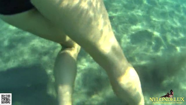 fishnet stocking in public sea and beach