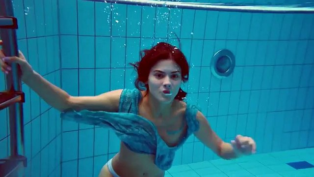 Beautiful redhead hairy pussy underwater