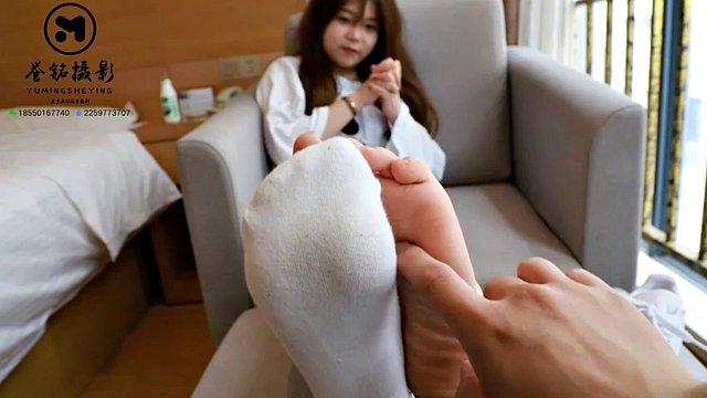 Chinese feet tickle