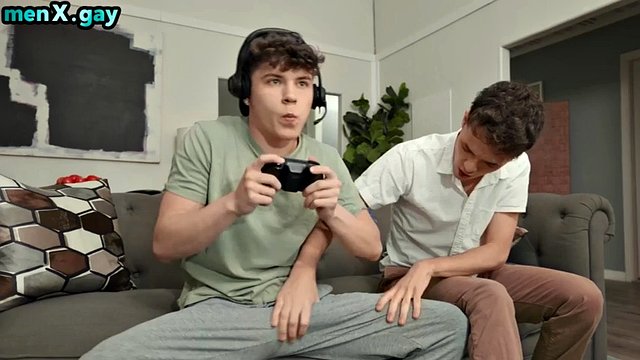 Skinny twink fucked bareback at home on the couch by the gamer's boyfriend