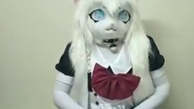 The guy controls the vibrator, bringing me to orgasm in a furry kigurumi maid costume