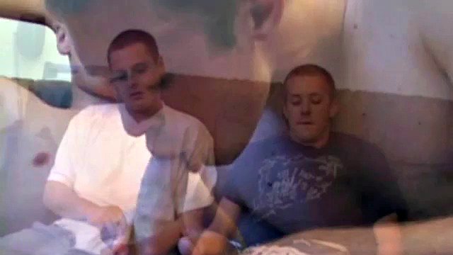 Tommy Nolan and Gunslinger Raines relax on the couch while watching porn. After taking off his clothes, Tommy sucks on Gunslinger's cock and then Gunslinger returns the favor.