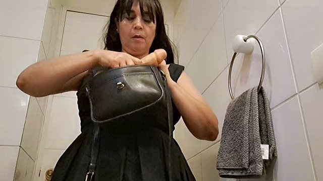 Sexy stepmom masturbates in the bathroom