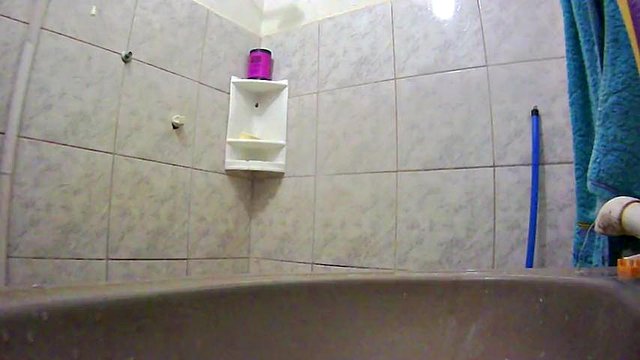 in the bathroom hidden from parents