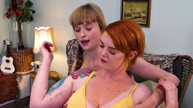 Hairy blonde licked and fingered by a redhead with huge tits