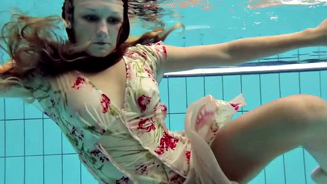 lucy takes the dress off showing her hairy pussy and titties underwater