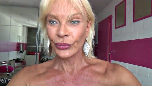 Blonde tranny gilf in high heels masturbates passionately