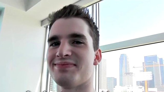 Fresh gay slut gags on cock on the casting