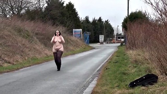 Ugly fat slut walking naked on a public road