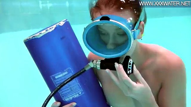 Hungarian porn star Minnie Manga enjoys riding a toy underwater