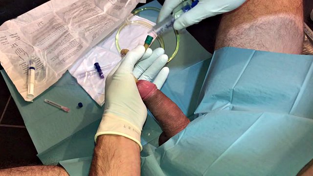 The first painful insertion of a catheter with cumshot into the urethra