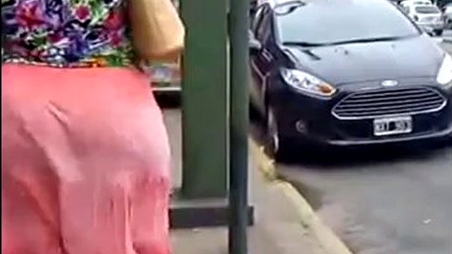 Big ass babe and calves in public in a loose skirt