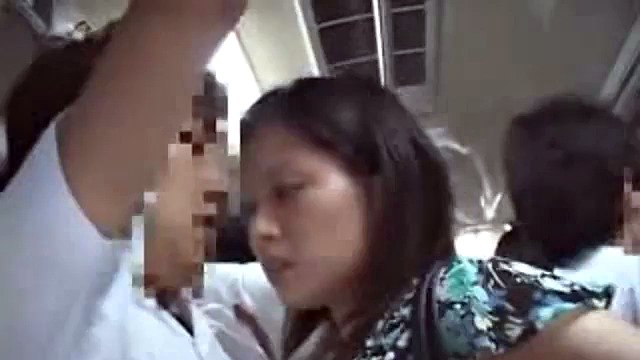Mature Japanese MILF is groped and fucked in a bus