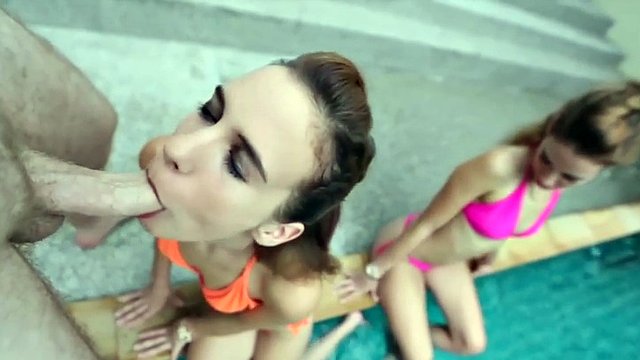 Blowjob from twins by the pool